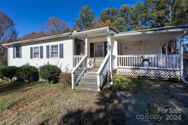 view of front of house featuring a porch and ceiling fan