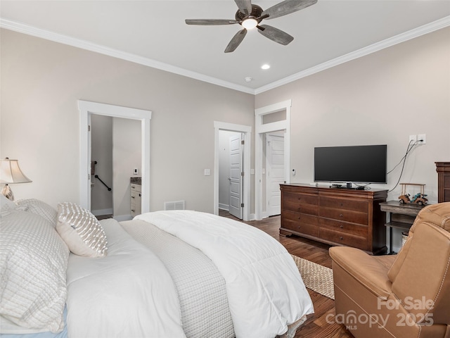 bedroom featuring visible vents, ornamental molding, dark wood-type flooring, and recessed lighting