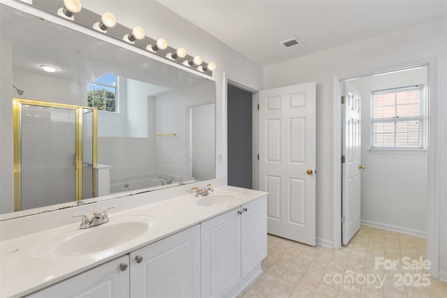 full bathroom with a sink, visible vents, a bath, and a shower stall