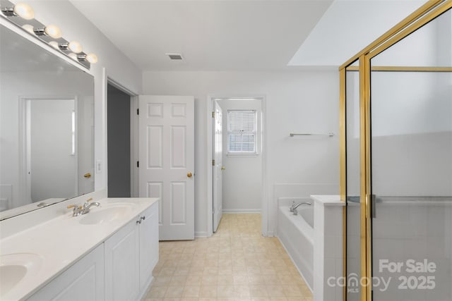 bathroom with visible vents, double vanity, a bath, an enclosed shower, and a sink