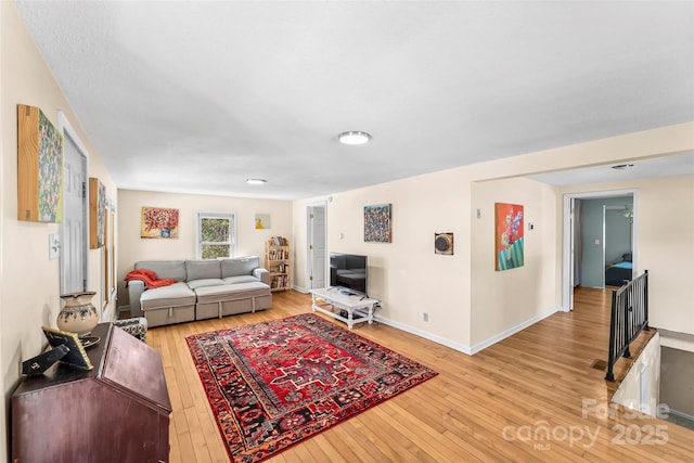 living room with light hardwood / wood-style floors