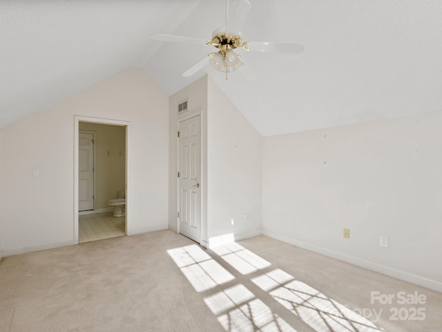 bonus room with light carpet, vaulted ceiling, and ceiling fan