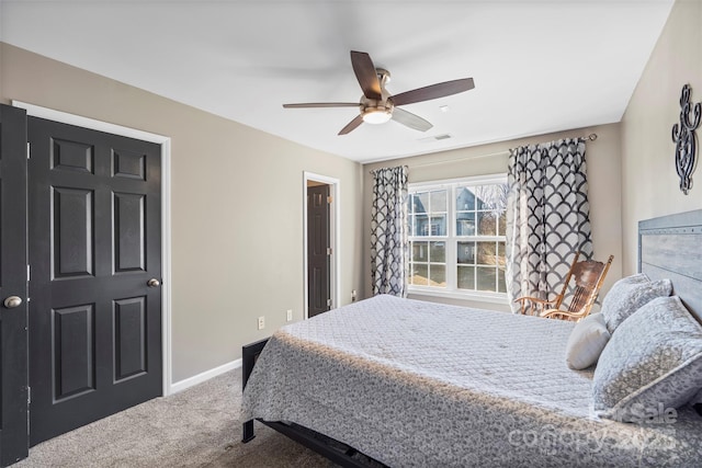 bedroom featuring ceiling fan and carpet