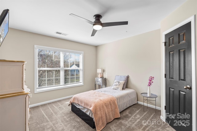 carpeted bedroom featuring ceiling fan