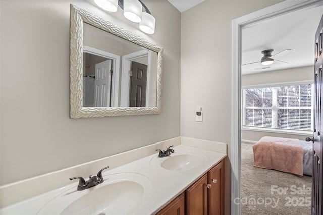 bathroom featuring ceiling fan and vanity