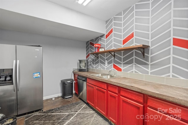 kitchen with appliances with stainless steel finishes and sink