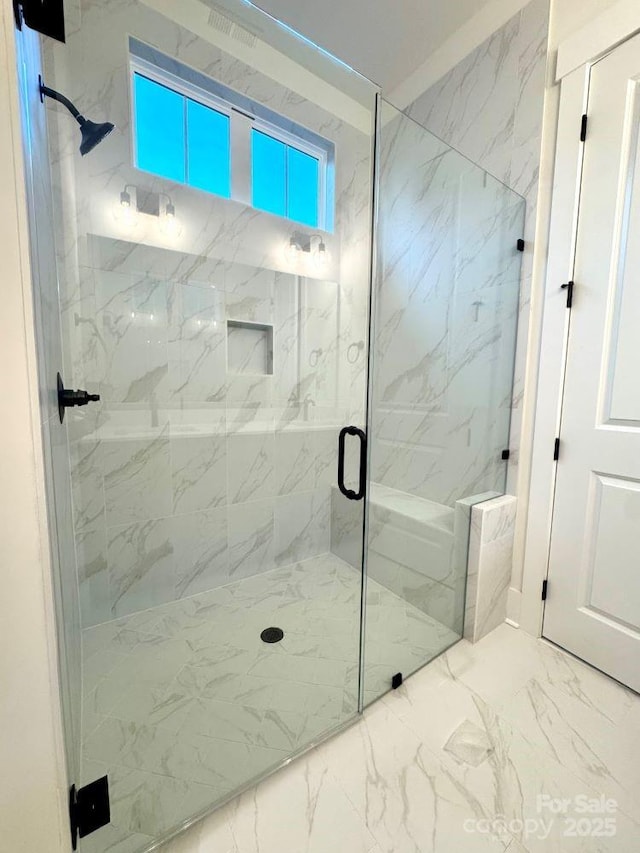 bathroom featuring walk in shower