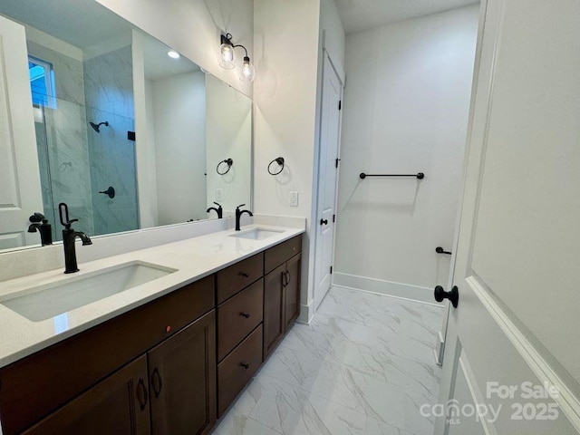 bathroom with walk in shower and vanity