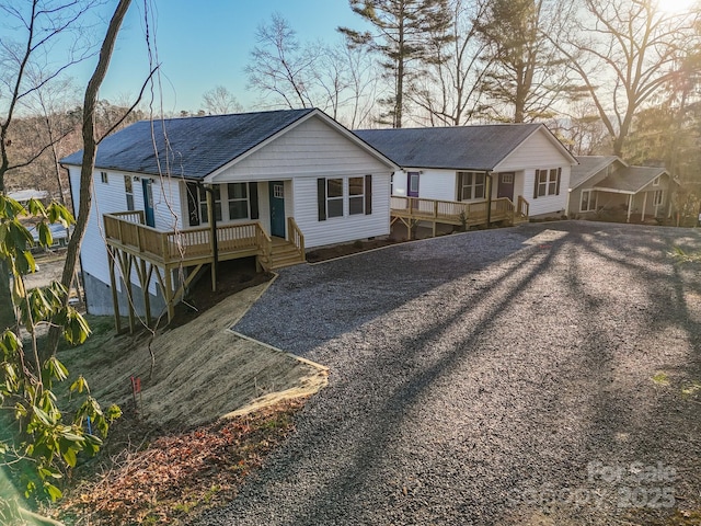 back of house with a porch