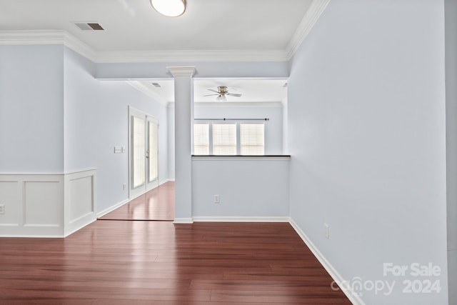 spare room with hardwood / wood-style flooring, ceiling fan, crown molding, and french doors