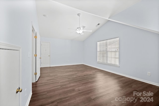 interior space with vaulted ceiling, ceiling fan, and dark wood-type flooring