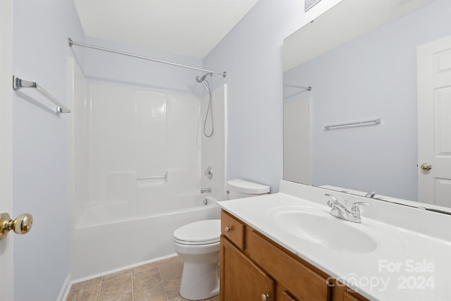 full bathroom featuring tile patterned floors, vanity,  shower combination, and toilet