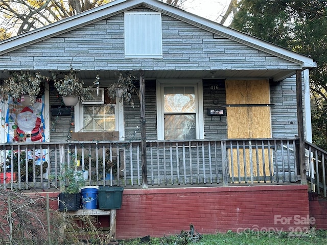 view of front of home featuring covered porch