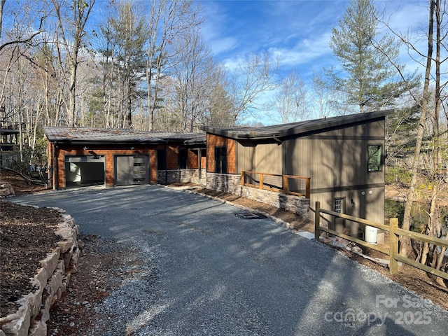 view of side of property with a garage