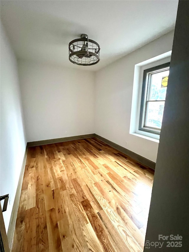 empty room featuring hardwood / wood-style flooring