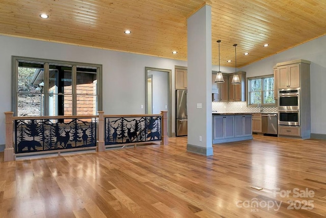 kitchen featuring wooden ceiling, light wood-style flooring, stainless steel appliances, hanging light fixtures, and backsplash