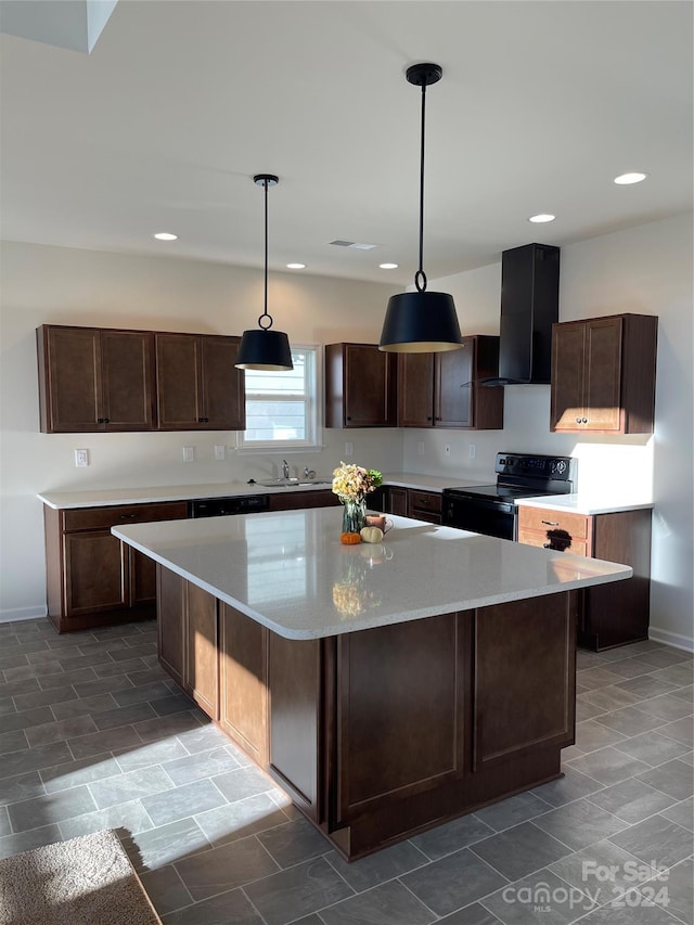 kitchen with a center island, dark brown cabinetry, hanging light fixtures, and black range with electric cooktop