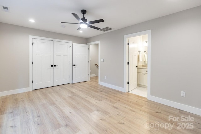 unfurnished bedroom with light wood-style floors, baseboards, recessed lighting, and visible vents
