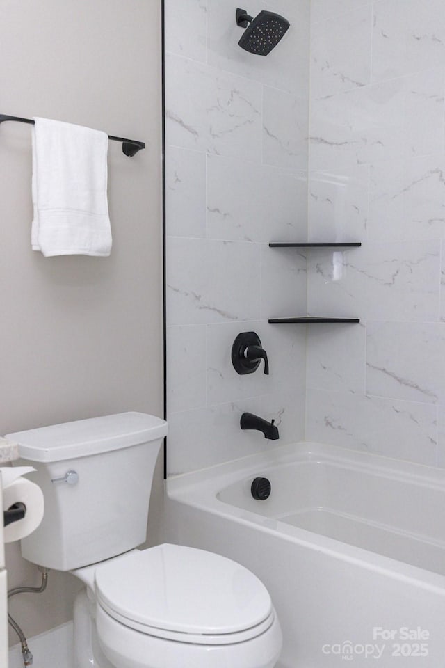 bathroom featuring  shower combination and toilet