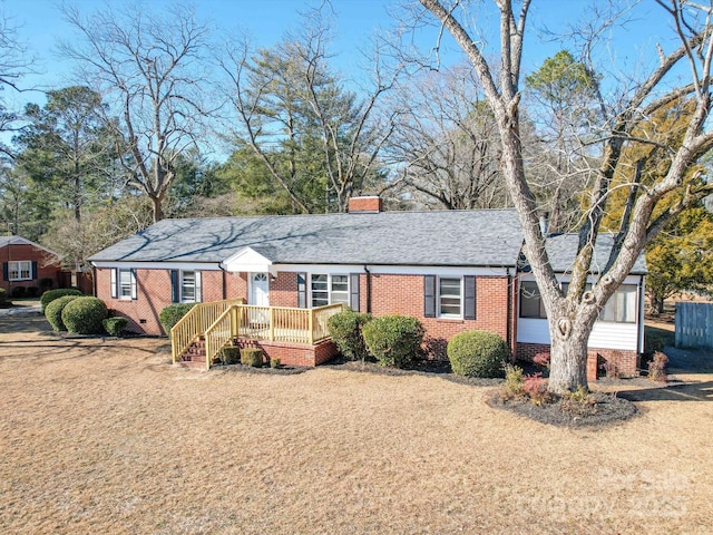 ranch-style house with a deck