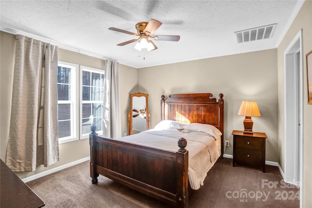 bedroom with multiple windows, ceiling fan, and carpet floors