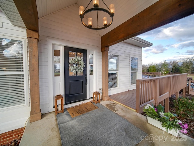 doorway to property featuring a deck