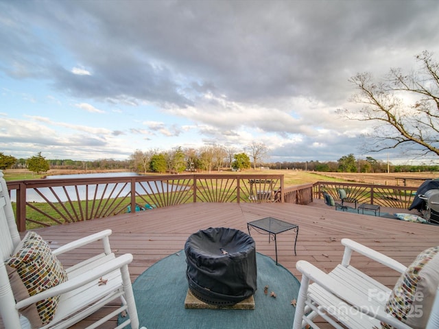 wooden terrace with area for grilling