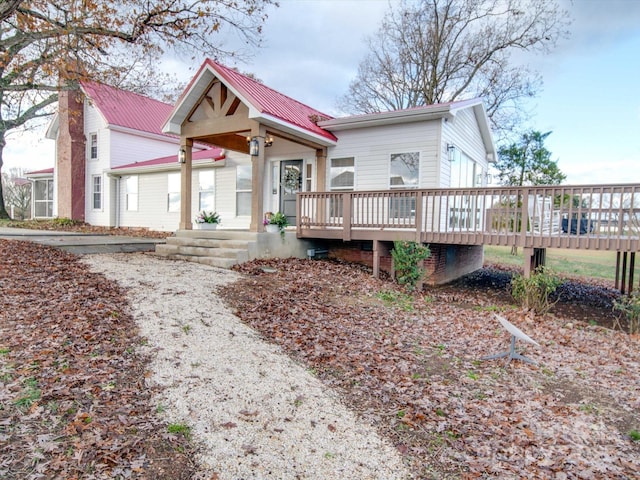 view of front of house with a deck