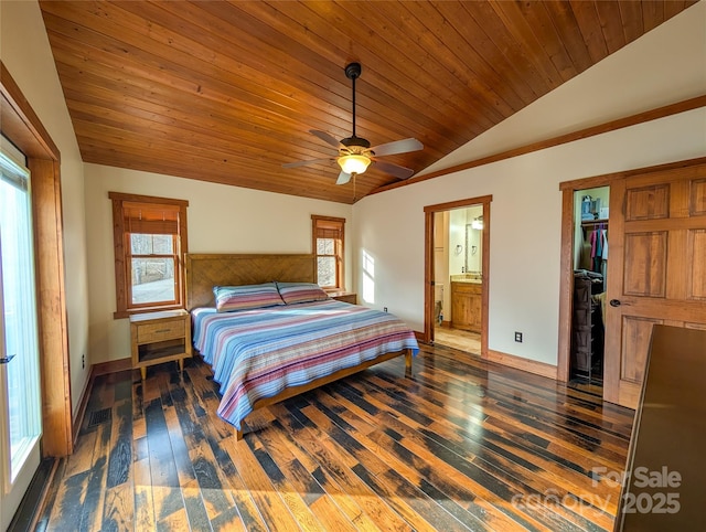 bedroom featuring vaulted ceiling, a spacious closet, hardwood / wood-style floors, and wood ceiling