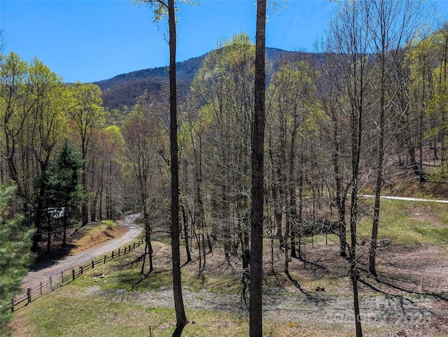 mountain view featuring a view of trees