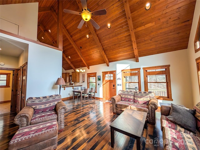 living room with wood ceiling, baseboards, wood-type flooring, and ceiling fan with notable chandelier