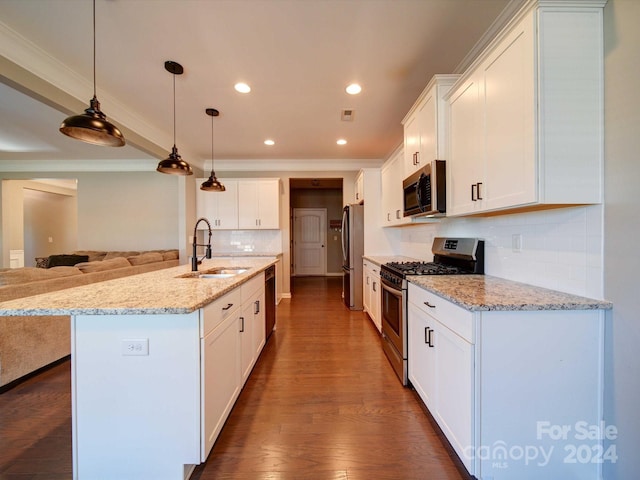 kitchen featuring dark wood-type flooring, sink, white cabinets, and stainless steel appliances