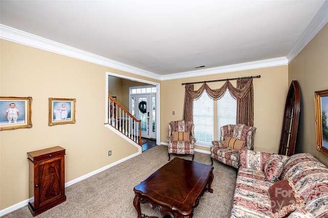 living room featuring french doors, carpet floors, and ornamental molding