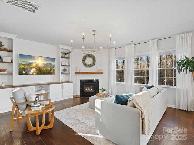 living room with dark hardwood / wood-style flooring