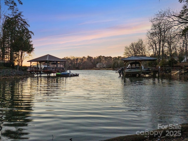 dock area featuring a water view