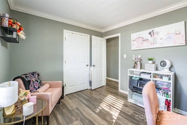 office area featuring dark hardwood / wood-style floors and crown molding