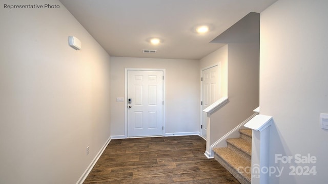 interior space with dark wood-type flooring