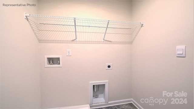 laundry area with hookup for an electric dryer and hookup for a washing machine