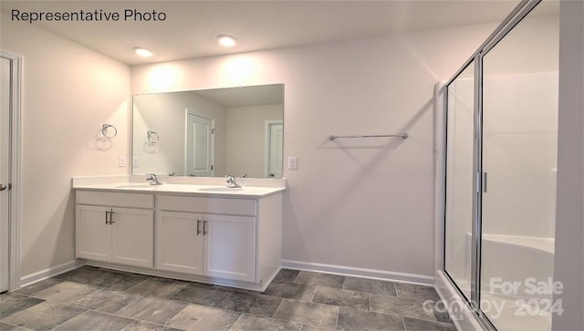 bathroom featuring vanity and walk in shower