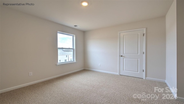 view of carpeted empty room