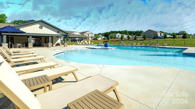 view of pool with a patio