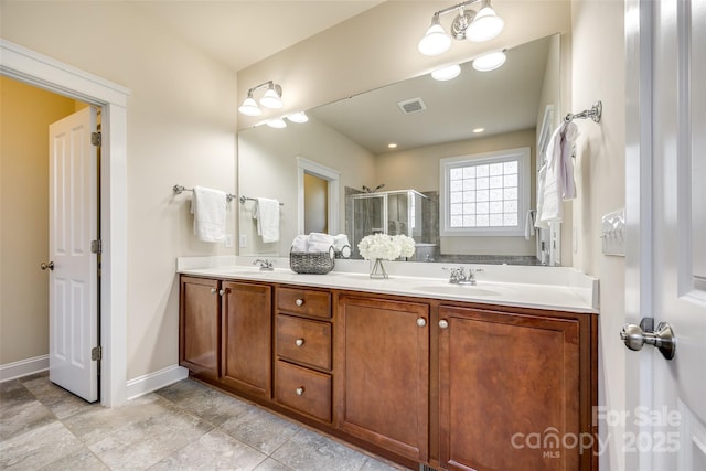 bathroom featuring vanity and walk in shower