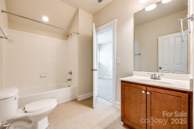 full bathroom with tile patterned floors, shower / washtub combination, vanity, and toilet