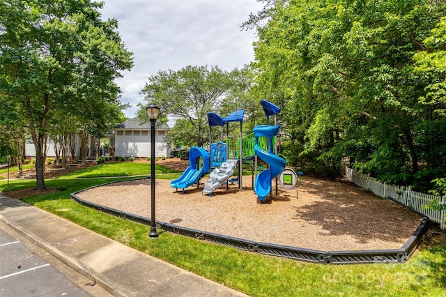 view of play area featuring a lawn