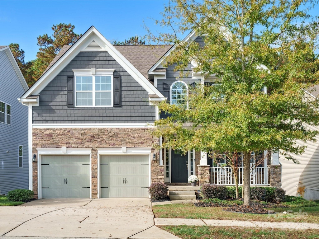 craftsman-style home featuring a garage