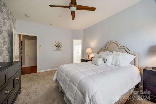 bedroom featuring ceiling fan and light carpet