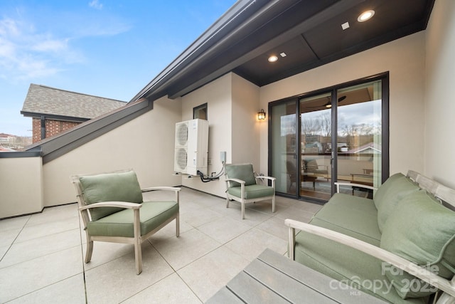 view of patio / terrace featuring an outdoor living space and ac unit