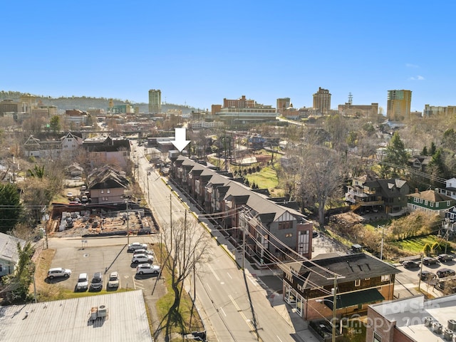 drone / aerial view with a view of city