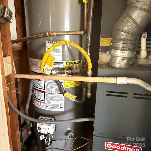 utility room featuring gas water heater