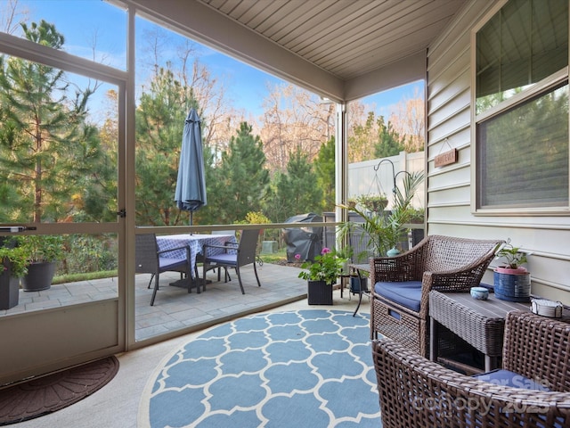 sunroom / solarium featuring a wealth of natural light